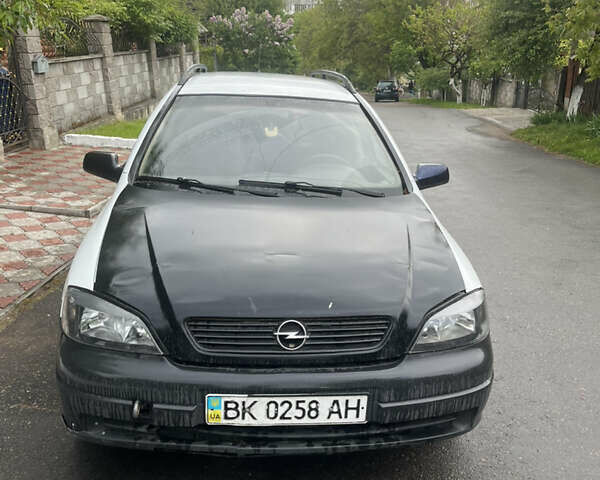 Белый Опель Астра, объемом двигателя 1.7 л и пробегом 300 тыс. км за 1650 $, фото 8 на Automoto.ua