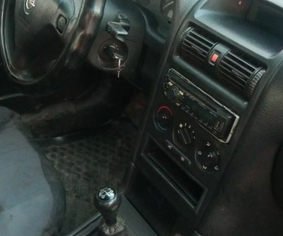 Білий Опель Астра, об'ємом двигуна 1.7 л та пробігом 250 тис. км за 1720 $, фото 6 на Automoto.ua