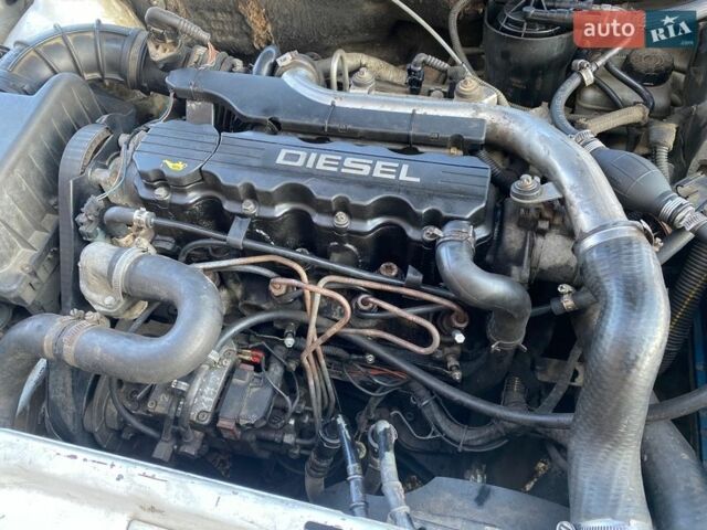 Белый Опель Астра, объемом двигателя 1.7 л и пробегом 385 тыс. км за 1599 $, фото 11 на Automoto.ua