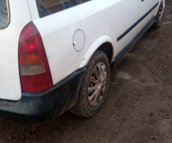 Білий Опель Астра, об'ємом двигуна 1.7 л та пробігом 250 тис. км за 1720 $, фото 2 на Automoto.ua