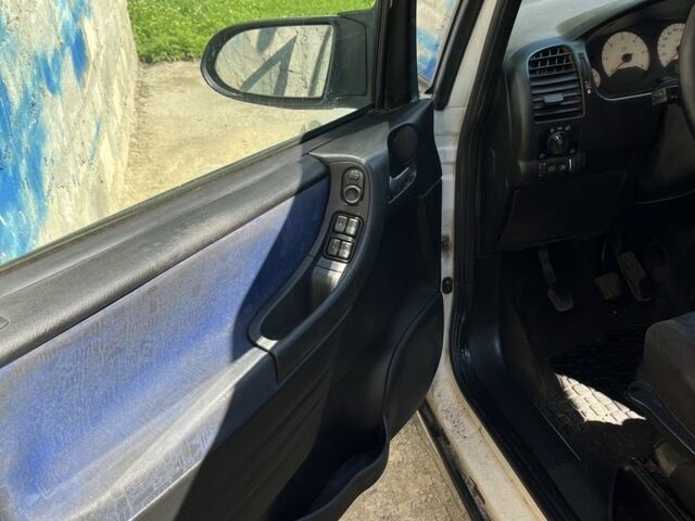 Белый Опель Астра, объемом двигателя 2 л и пробегом 250 тыс. км за 1200 $, фото 5 на Automoto.ua