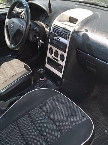 Белый Опель Астра, объемом двигателя 1.6 л и пробегом 294 тыс. км за 3500 $, фото 4 на Automoto.ua