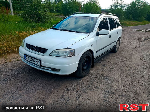 Белый Опель Астра, объемом двигателя 1.8 л и пробегом 250 тыс. км за 2500 $, фото 1 на Automoto.ua