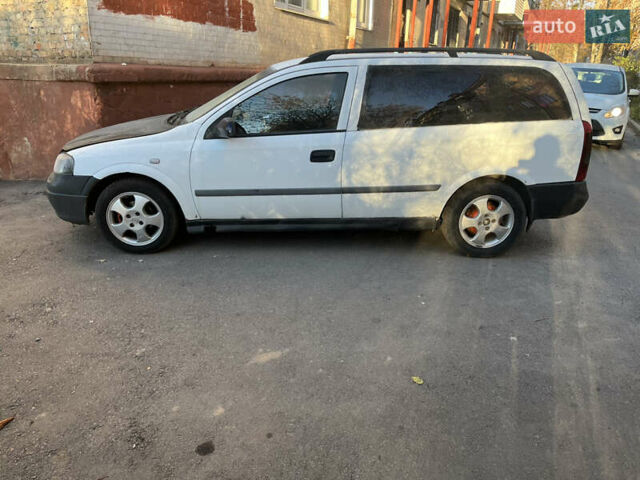 Белый Опель Астра, объемом двигателя 1.7 л и пробегом 300 тыс. км за 1650 $, фото 4 на Automoto.ua