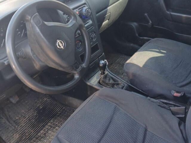 Белый Опель Астра, объемом двигателя 1.4 л и пробегом 200 тыс. км за 1700 $, фото 7 на Automoto.ua