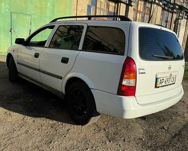 Белый Опель Астра, объемом двигателя 1.4 л и пробегом 270 тыс. км за 3000 $, фото 14 на Automoto.ua