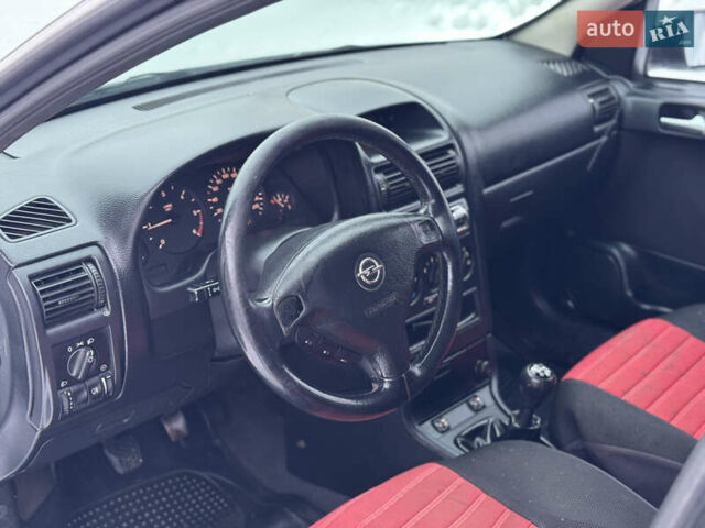 Белый Опель Астра, объемом двигателя 2 л и пробегом 295 тыс. км за 2300 $, фото 15 на Automoto.ua