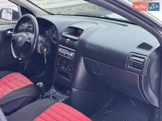 Белый Опель Астра, объемом двигателя 2 л и пробегом 295 тыс. км за 2300 $, фото 21 на Automoto.ua