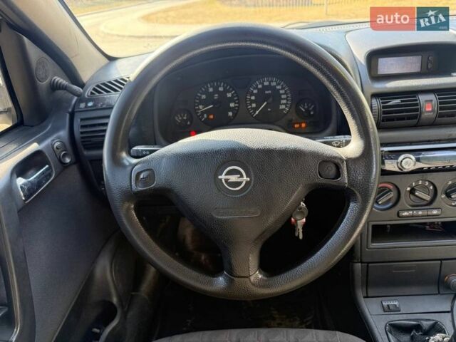 Білий Опель Астра, об'ємом двигуна 1.57 л та пробігом 207 тис. км за 2100 $, фото 13 на Automoto.ua