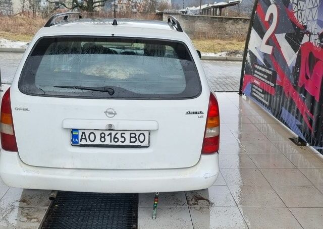 Белый Опель Астра, объемом двигателя 1.6 л и пробегом 266 тыс. км за 3700 $, фото 9 на Automoto.ua
