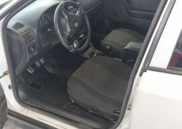 Белый Опель Астра, объемом двигателя 1.6 л и пробегом 266 тыс. км за 3700 $, фото 11 на Automoto.ua