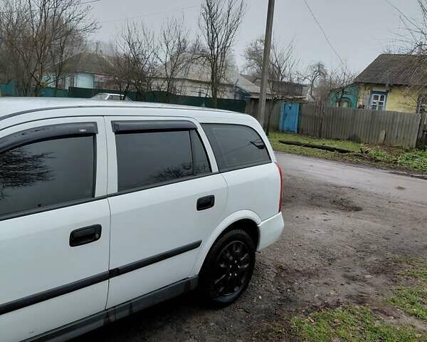 Белый Опель Астра, объемом двигателя 1.6 л и пробегом 285 тыс. км за 3000 $, фото 3 на Automoto.ua