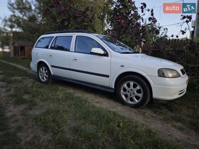 Белый Опель Астра, объемом двигателя 1.69 л и пробегом 493 тыс. км за 3200 $, фото 2 на Automoto.ua