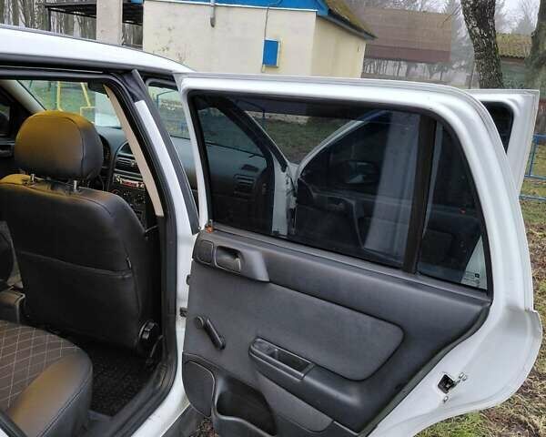 Белый Опель Астра, объемом двигателя 1.6 л и пробегом 285 тыс. км за 3000 $, фото 13 на Automoto.ua