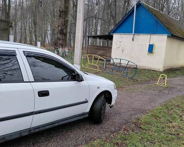 Белый Опель Астра, объемом двигателя 1.6 л и пробегом 285 тыс. км за 3000 $, фото 9 на Automoto.ua