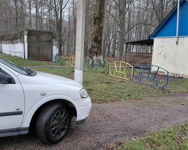 Белый Опель Астра, объемом двигателя 1.6 л и пробегом 285 тыс. км за 3000 $, фото 10 на Automoto.ua