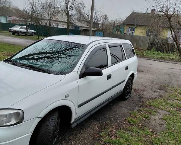 Белый Опель Астра, объемом двигателя 1.6 л и пробегом 285 тыс. км за 3000 $, фото 2 на Automoto.ua