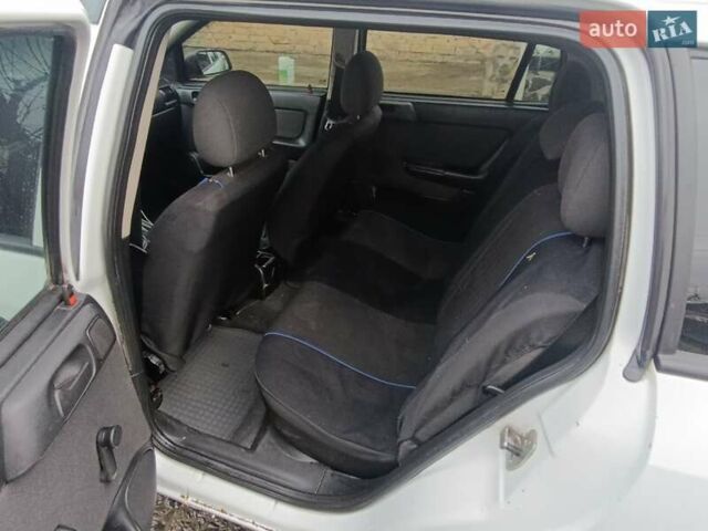 Белый Опель Астра, объемом двигателя 1.4 л и пробегом 327 тыс. км за 2300 $, фото 10 на Automoto.ua