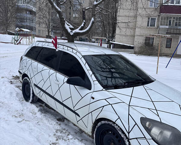 Белый Опель Астра, объемом двигателя 1.91 л и пробегом 426 тыс. км за 4500 $, фото 2 на Automoto.ua