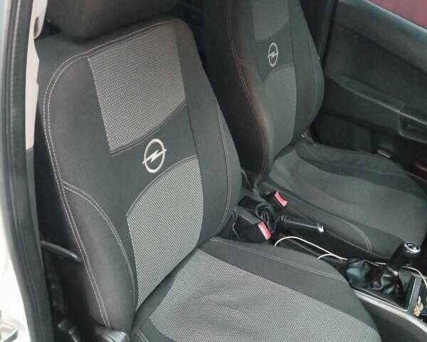 Білий Опель Астра, об'ємом двигуна 1.25 л та пробігом 308 тис. км за 4700 $, фото 6 на Automoto.ua
