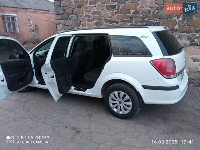 Білий Опель Астра, об'ємом двигуна 1.25 л та пробігом 308 тис. км за 4700 $, фото 12 на Automoto.ua