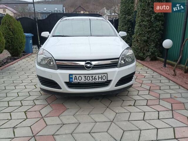 Белый Опель Астра, объемом двигателя 1.9 л и пробегом 210 тыс. км за 3850 $, фото 9 на Automoto.ua