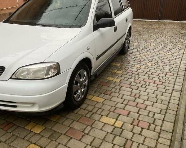 Белый Опель Астра, объемом двигателя 1.7 л и пробегом 314 тыс. км за 3800 $, фото 14 на Automoto.ua