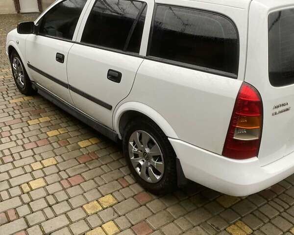 Белый Опель Астра, объемом двигателя 1.7 л и пробегом 314 тыс. км за 3800 $, фото 8 на Automoto.ua