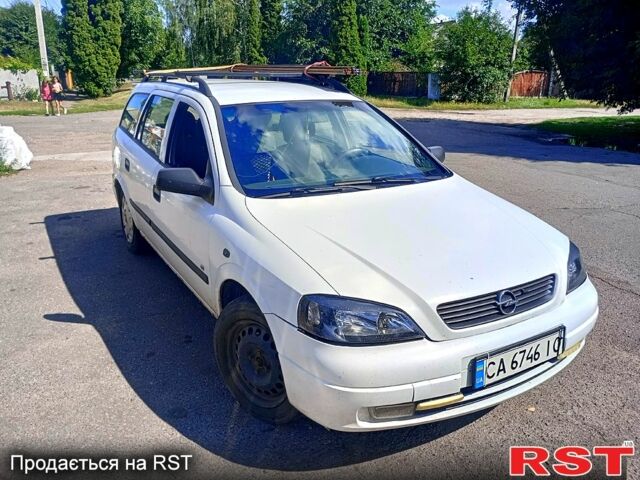 Белый Опель Астра, объемом двигателя 1.7 л и пробегом 400 тыс. км за 2300 $, фото 1 на Automoto.ua