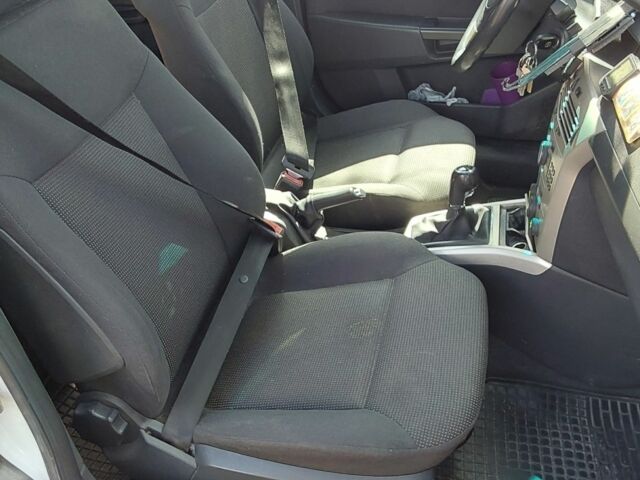 Білий Опель Астра, об'ємом двигуна 1.2 л та пробігом 249 тис. км за 4251 $, фото 4 на Automoto.ua