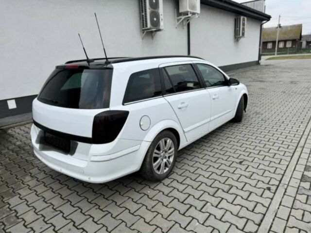 Белый Опель Астра, объемом двигателя 1.7 л и пробегом 324 тыс. км за 2150 $, фото 2 на Automoto.ua