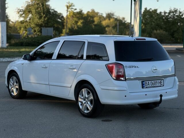 Білий Опель Астра, об'ємом двигуна 1.8 л та пробігом 200 тис. км за 3499 $, фото 4 на Automoto.ua