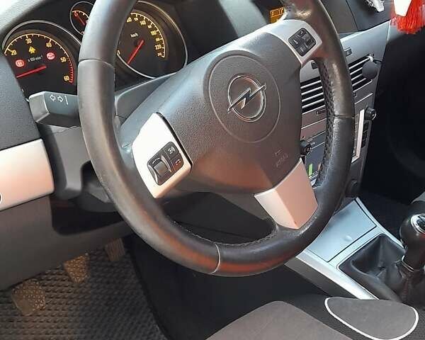 Белый Опель Астра, объемом двигателя 1.25 л и пробегом 220 тыс. км за 5300 $, фото 10 на Automoto.ua