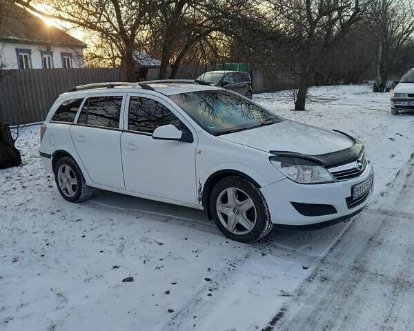 Белый Опель Астра, объемом двигателя 1.25 л и пробегом 220 тыс. км за 5300 $, фото 1 на Automoto.ua