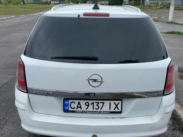 Білий Опель Астра, об'ємом двигуна 1.69 л та пробігом 301 тис. км за 5500 $, фото 3 на Automoto.ua
