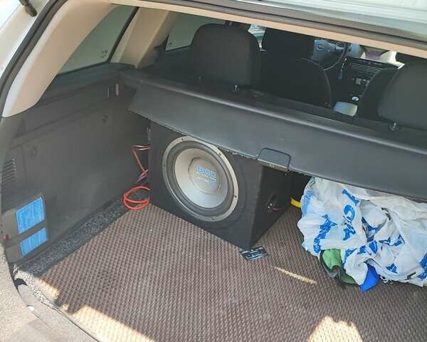 Белый Опель Астра, объемом двигателя 1.69 л и пробегом 320 тыс. км за 5800 $, фото 16 на Automoto.ua