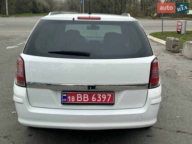 Белый Опель Астра, объемом двигателя 1.6 л и пробегом 223 тыс. км за 6199 $, фото 4 на Automoto.ua