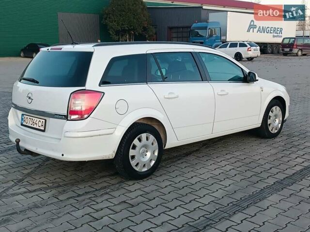 Белый Опель Астра, объемом двигателя 1.7 л и пробегом 245 тыс. км за 5600 $, фото 8 на Automoto.ua