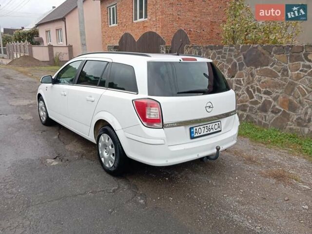 Белый Опель Астра, объемом двигателя 1.7 л и пробегом 245 тыс. км за 5250 $, фото 6 на Automoto.ua
