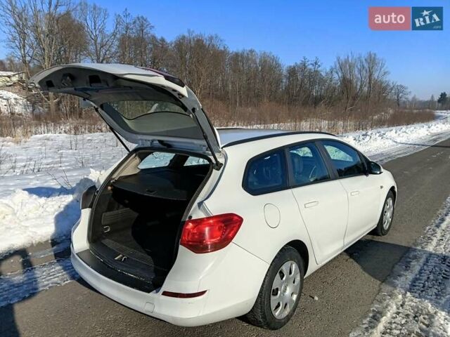 Білий Опель Астра, об'ємом двигуна 1.25 л та пробігом 370 тис. км за 5300 $, фото 9 на Automoto.ua