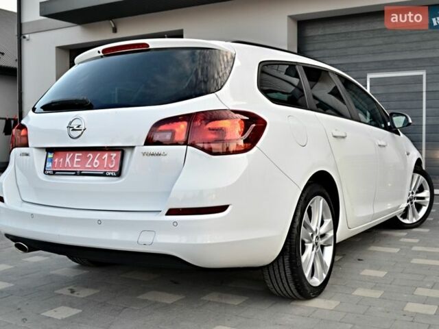 Білий Опель Астра, об'ємом двигуна 1.4 л та пробігом 228 тис. км за 6555 $, фото 6 на Automoto.ua