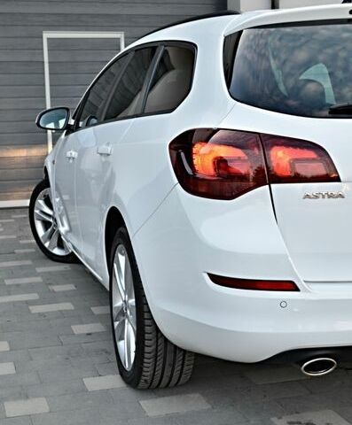 Білий Опель Астра, об'ємом двигуна 1.4 л та пробігом 228 тис. км за 6555 $, фото 24 на Automoto.ua