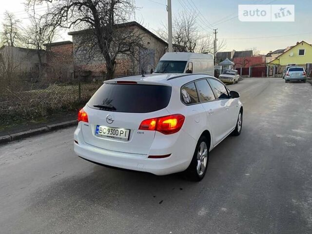Білий Опель Астра, об'ємом двигуна 1.69 л та пробігом 228 тис. км за 7400 $, фото 7 на Automoto.ua
