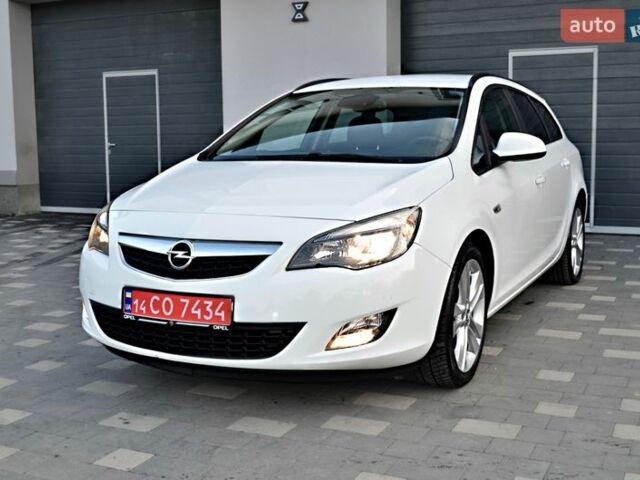 Білий Опель Астра, об'ємом двигуна 1.4 л та пробігом 228 тис. км за 6555 $, фото 26 на Automoto.ua