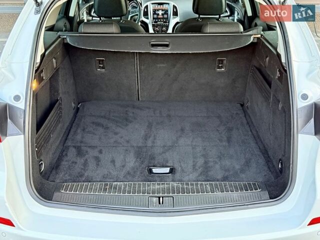 Білий Опель Астра, об'ємом двигуна 1.4 л та пробігом 228 тис. км за 6555 $, фото 23 на Automoto.ua