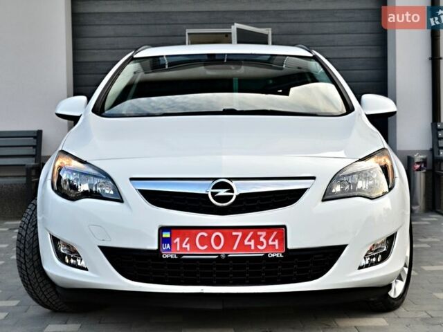 Білий Опель Астра, об'ємом двигуна 1.4 л та пробігом 228 тис. км за 6555 $, фото 2 на Automoto.ua