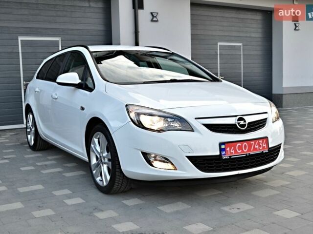 Білий Опель Астра, об'ємом двигуна 1.4 л та пробігом 228 тис. км за 6555 $, фото 30 на Automoto.ua