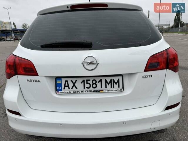 Белый Опель Астра, объемом двигателя 1.7 л и пробегом 235 тыс. км за 7500 $, фото 4 на Automoto.ua