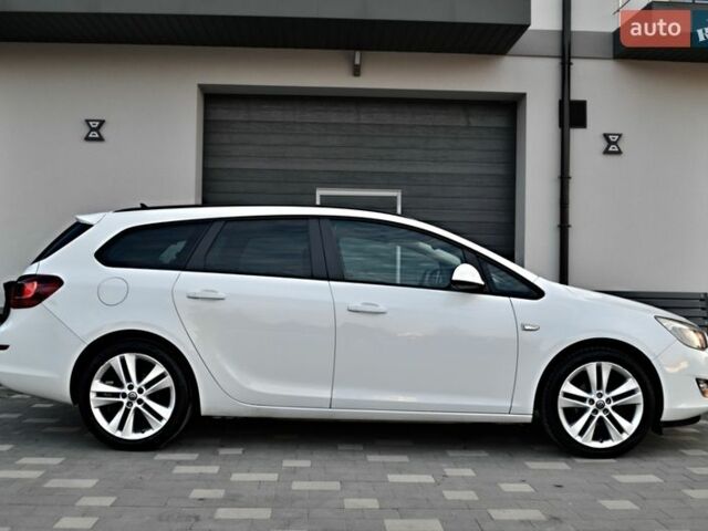 Білий Опель Астра, об'ємом двигуна 1.4 л та пробігом 228 тис. км за 6555 $, фото 5 на Automoto.ua