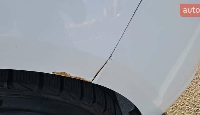 Белый Опель Астра, объемом двигателя 1.69 л и пробегом 261 тыс. км за 7500 $, фото 12 на Automoto.ua